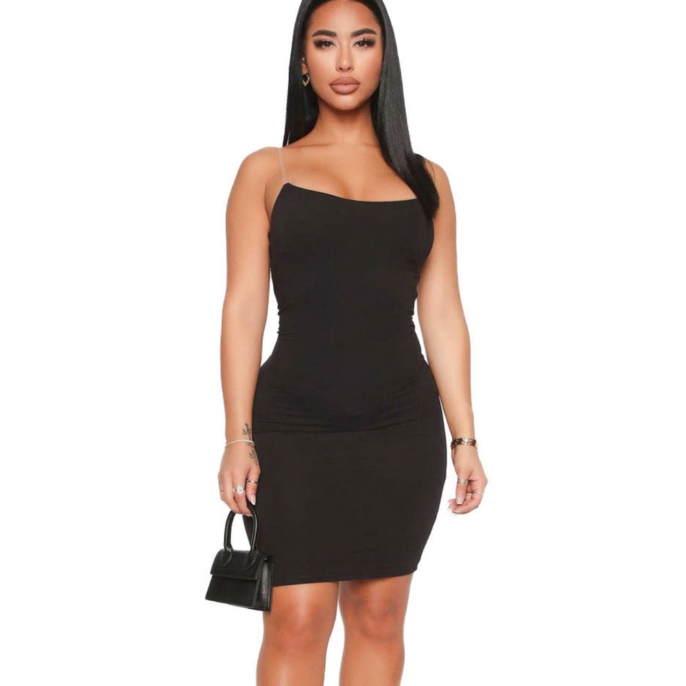 Never worn, in its bag.